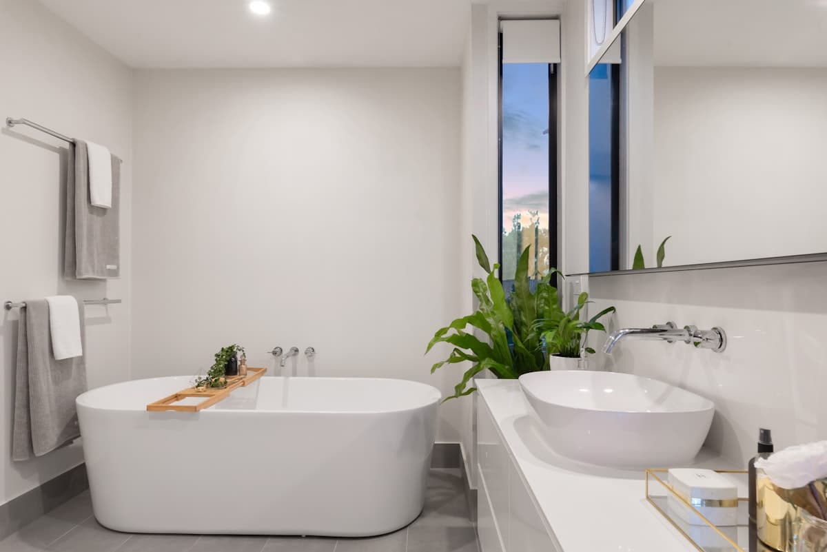 modern bathroom with a toilet seat cover